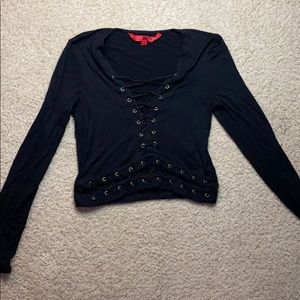 Black long sleeve crop top . v-Cut . Revealing .